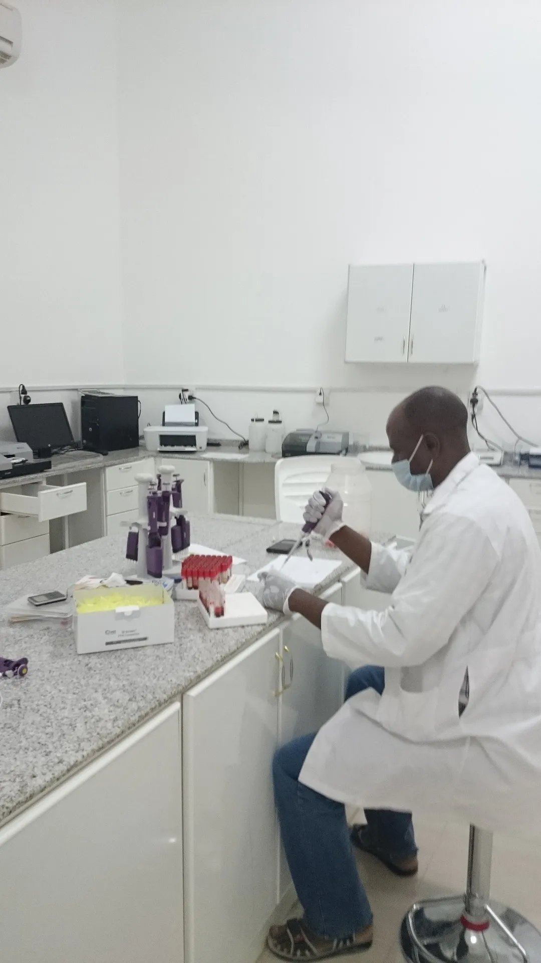 A laboratory technician at work in the Buraimi quarantine laboratory